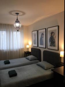 Posteľ alebo postele v izbe v ubytovaní Thermal Forest Apartment