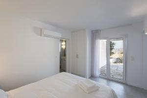 Fotografie z fotogalerie ubytování 67sq meters modern apartment with a swimming pool and sea view in Koundouros v destinaci Koundouros