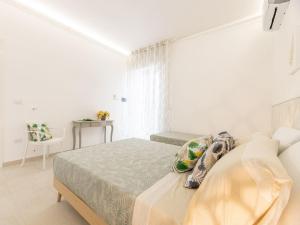 Postel nebo postele na pokoji v ubytování Oro Blu