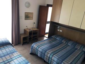 Postel nebo postele na pokoji v ubytování Hotel Ondina