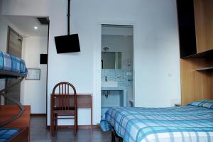 Postel nebo postele na pokoji v ubytování Hotel Ondina
