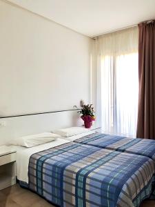 Postel nebo postele na pokoji v ubytování Hotel Ondina