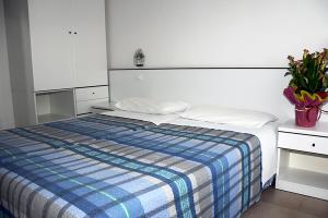 Postel nebo postele na pokoji v ubytování Hotel Ondina