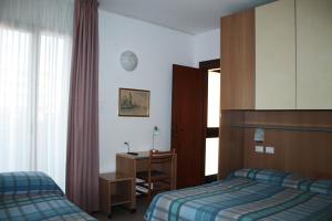 Postel nebo postele na pokoji v ubytování Hotel Ondina