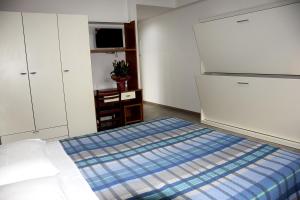 Postel nebo postele na pokoji v ubytování Hotel Ondina