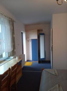 Postel nebo postele na pokoji v ubytování Dom Kącik