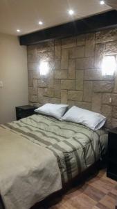 Ένα ή περισσότερα κρεβάτια σε δωμάτιο στο CASA 2