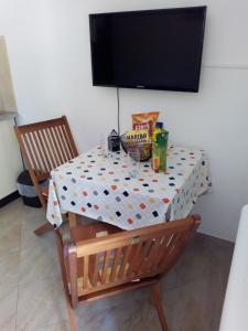 TV a/nebo společenská místnost v ubytování Apartman Leo