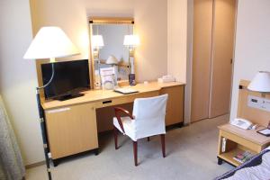 TV a/nebo společenská místnost v ubytování Grand Hotel Hakusan