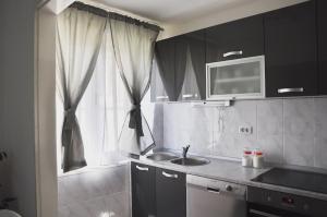 Kuchyň nebo kuchyňský kout v ubytování Apartment Center