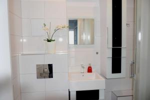 Kúpeľňa v ubytovaní Blue Sky Apartament + 31 fotografií