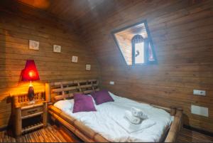 Tempat tidur dalam kamar di SIERRA NEVADA DELUXE