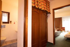 Un pat sau paturi într-o cameră la Hotel Vanda