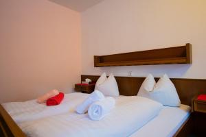 Un pat sau paturi într-o cameră la Hotel Vanda