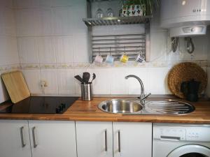 Kuchyň nebo kuchyňský kout v ubytování Apartamento playa de Levante