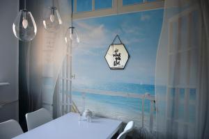 Posteľ alebo postele v izbe v ubytovaní Blue Sky Apartament