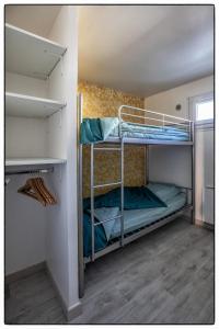 Dviaukštė lova arba lovos apgyvendinimo įstaigoje Le Florence - Duplex moderne climatisé avec garage