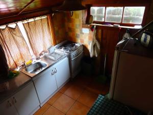 Kuchyň nebo kuchyňský kout v ubytování Guest House MiLinco - Ala Maison