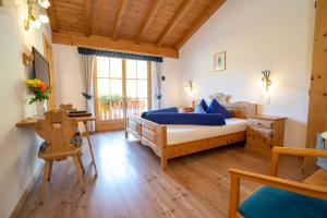 Postel nebo postele na pokoji v ubytování Hotel Crusch Alba Sta Maria