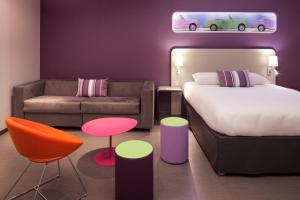 Postel nebo postele na pokoji v ubytování ibis Styles Montbéliard + 37 fotografií