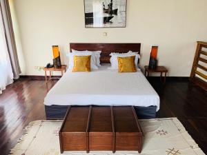 Ein Bett oder Betten in einem Zimmer der Unterkunft Marcelo Beach Club