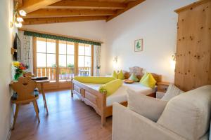 Voodi või voodid majutusasutuse Hotel Crusch Alba Sta Maria toas