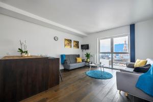 Et tv og/eller underholdning på Centre Point Ilumino by LovŁódźApartments