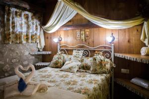 Katil atau katil-katil dalam bilik di Lo Racó de Peret
