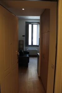 A bed or beds in a room at Goldoni77 - 3mins from Dateo station
