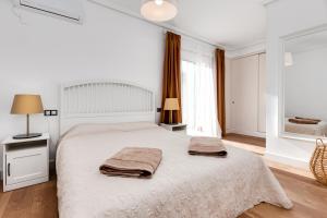 A bed or beds in a room at HABANERAS