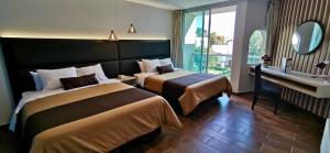 Postel nebo postele na pokoji v ubytování Hotel Posada Señorial