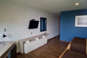 TV a/nebo společenská místnost v ubytování Hotel Posada Señorial