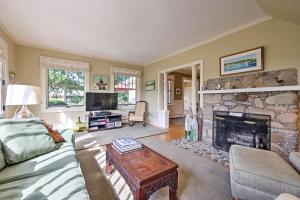 a living room with a couch and a fireplace at Southwest Harbor Home-3 Min to Acadia Natl Park in Southwest Harbor