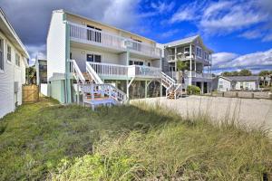 a large house on the beach with a balcony at Bright Fernandina Beach Townhome Walk to Ocean! in Fernandina Beach