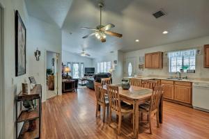 a kitchen and living room with a table and chairs at Patio and Mtn Views Tranquil Sedona Gem in Sedona