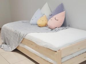 Postel nebo postele na pokoji v ubytování Octagon Ipoh by Plush
