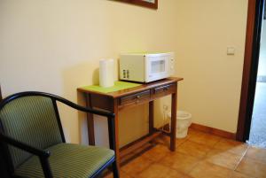 A kitchen or kitchenette at Hostal El Mirador