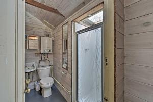 a bathroom with a toilet and a sink at Cozy Vineyard Haven Cottage Less Than 1 Mi to Beach! in Vineyard Haven +17 photos