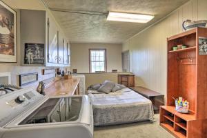 a bedroom with a bed and a sink in it at Spacious Home 2 Mi from Downtown Stanford! in Stanford +20 photos