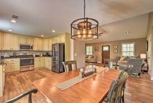 a kitchen and living room with a table and chairs at Dahlonega Home with Yard near Hiking and Downtown in Dahlonega