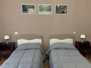 Posteľ alebo postele v izbe v ubytovaní Dimora del Casale
