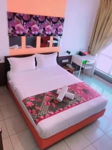Postel nebo postele na pokoji v ubytování Langit Langi Hotel @ KLIA/KLIA2