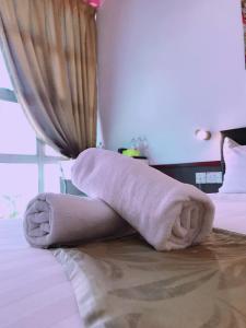 Postel nebo postele na pokoji v ubytování Langit Langi Hotel @ KLIA/KLIA2