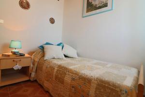 Letto o letti in una camera di Central Apartment On The Beach With Balcony, Wi-fi & Air Conditioning; Parking