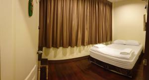 Posteľ alebo postele v izbe v ubytovaní Papermoon Guesthouse