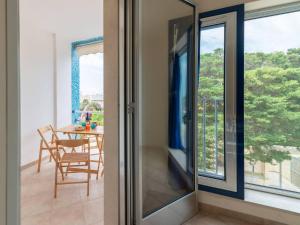 A balcony or terrace at Bright Apartment Near The Beach In Otranto