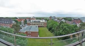 a view of a city from a building at Haus Dünenbake, Ferienwohnung Strandpeter Meerblick (Wohnung 47) in Sankt Peter-Ording