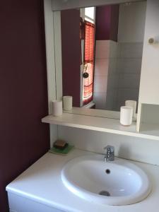 Koupelna v ubytování le jardin du controleur + 13 fotografií