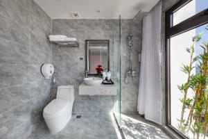 Koupelna v ubytování Ivy Hotel Nha Trang