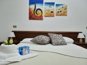 Postel nebo postele na pokoji v ubytování IERRE B&B il piacere dell accoglienza